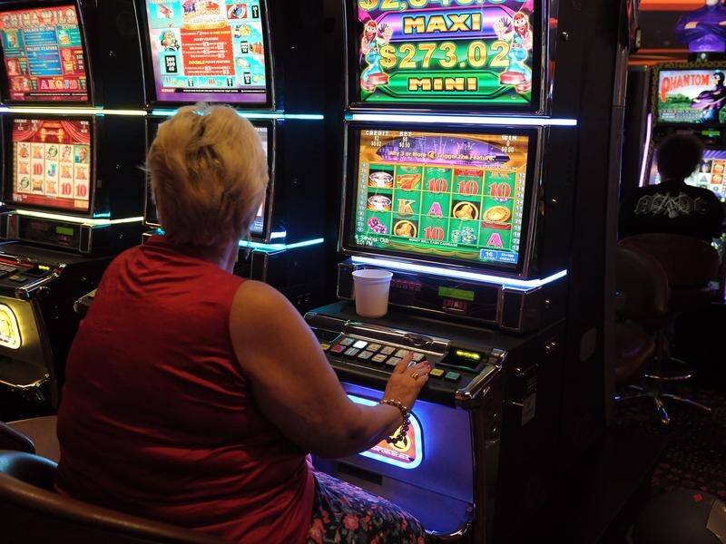 The Victorian Greens have negotiated restrictions on daily betting losses on pokies in the state. (Dan Peled/AAP PHOTOS)