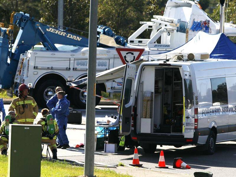 The bus crashed at a roundabout on Wine Country Drive near Greta in the Hunter Valley. (Darren Pateman/AAP PHOTOS)