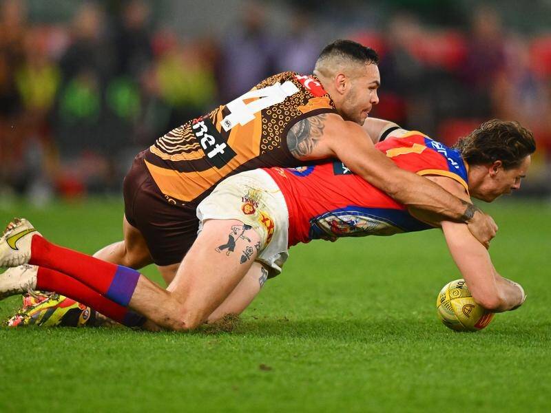 The AFL, after some coaching backlash, has made a call to change the holding-the-ball rule. (Morgan Hancock/AAP PHOTOS)