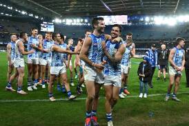 The Kangaroos proved they were up for the fight during their four-point win over the Suns. (James Ross/AAP PHOTOS)