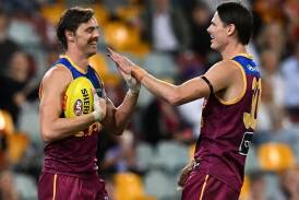 Brisbane's Joe Daniher (left) and Eric Hipwood have been firing in attack for the Lions. (Darren England/AAP PHOTOS)