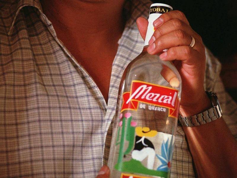 A container bound for Australia with bottles labelled as mezcal were uncovered as meth in Mexico. (AP)