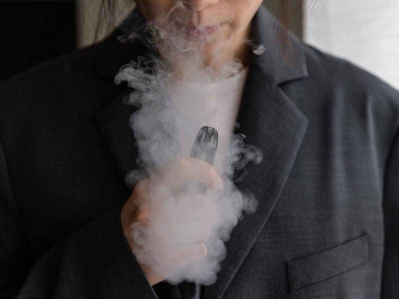 Older Australians are the most likely to smoke tobacco and younger people more likely to vape. (Diego Fedele/AAP PHOTOS)