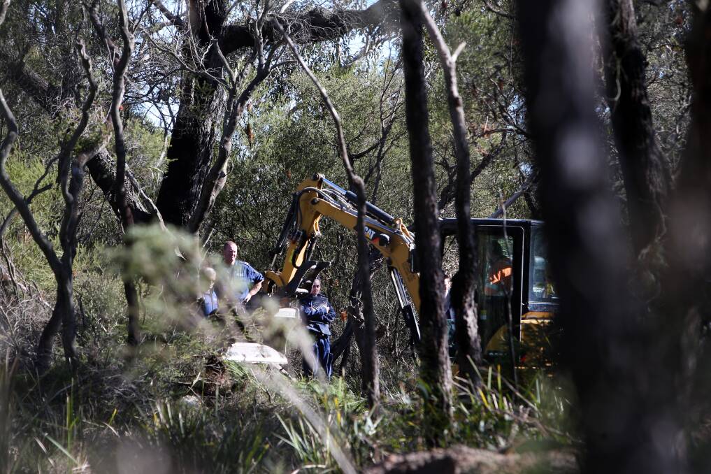 Police dig up bushland at Cataract on Tuesday, as the latest search for the remains of missing Sydney schoolgirl Quanne Diec continued. Picture: Sylvia Liber
