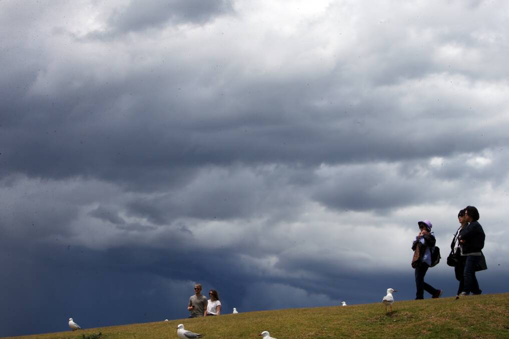 Stormy skies over Flagstaff Hill earlier this month. After a warm weekend, there's a medium chance of showers on Christmas Day. Boxing Day will be cloudy with the slight chance of a morning shower. Picture: Sylvia Liber 