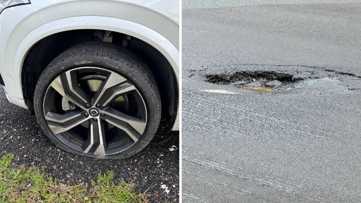 A flat tyre after a double puncture from driving into a pothole on the Pacific Highway. Pictures by Craig Arthur