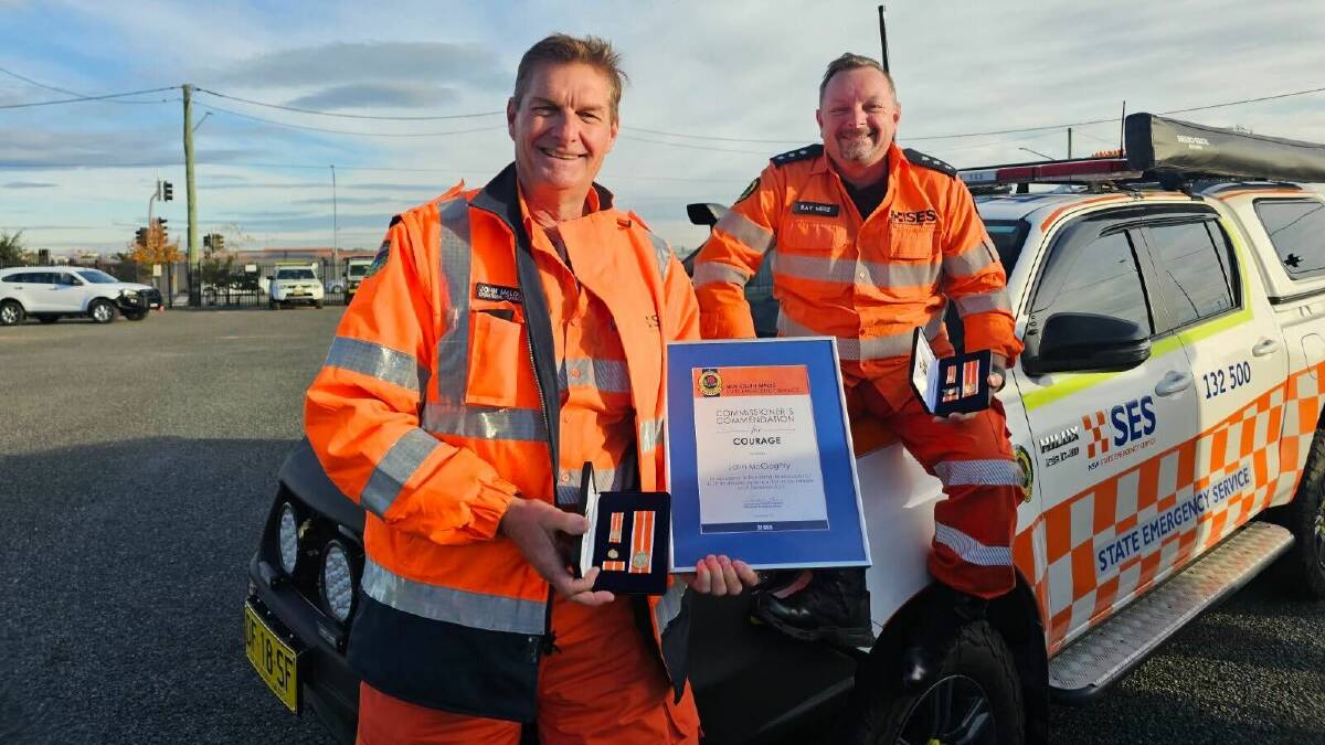 SES Shellharbour unit volunteers John McCloghry and Ray Merz received the Commissioner's Commendation for Courage on Wednesday, June 19, 2024. Picture supplied