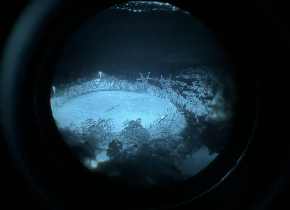 The view through United States Defence Force issued night vision goggles use by NSW Police PolAir crews. Pictures supplied