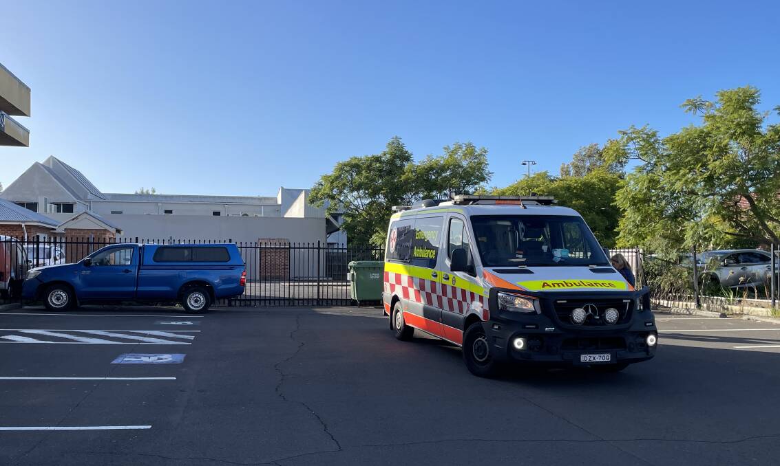 A man in his 70s was treated by paramedics after crashing his car backwards through a medical centre fence in Dapto. Pictures by Nadine Morton, Dapto FRNSW