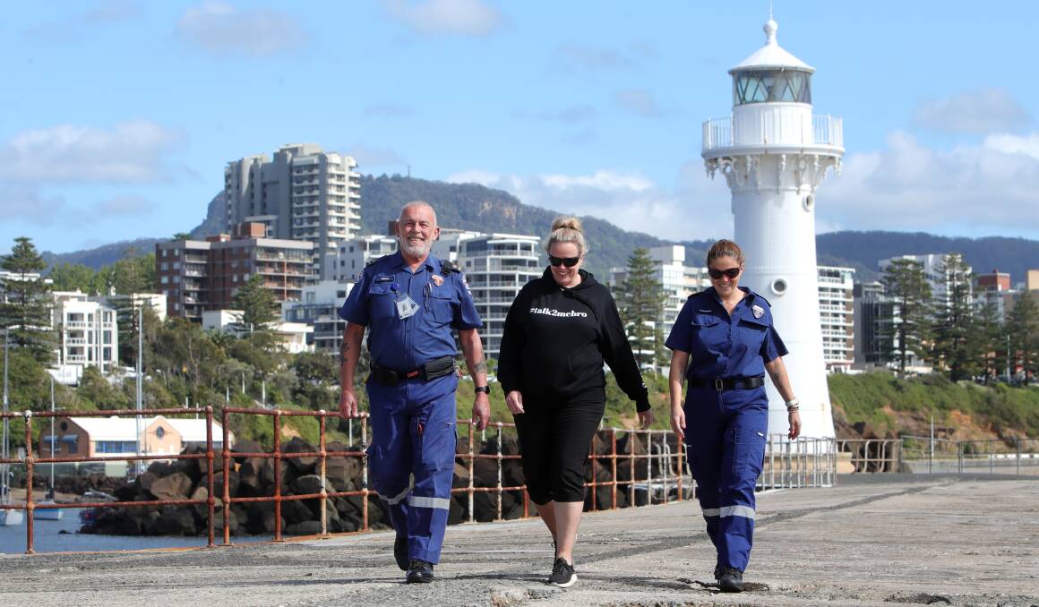 Inspector Norm Rees, Illawarra journalist Nadine Morton and paramedic Vanessa Gibson during a fundraising walk for local mental health charity Talk2MeBro. Picture by Sylvia Liber