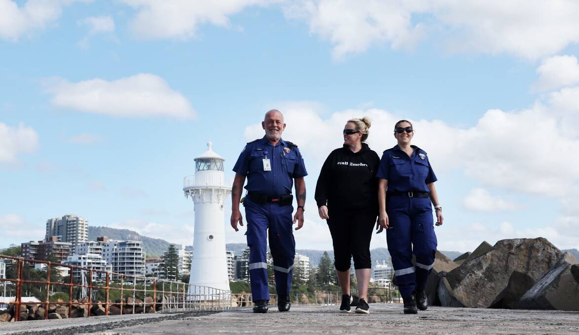 Inspector Norm Rees, Illawarra journalist Nadine Morton and paramedic Vanessa Gibson during a fundraising walk for local mental health charity Talk2MeBro. Picture by Sylvia Liber