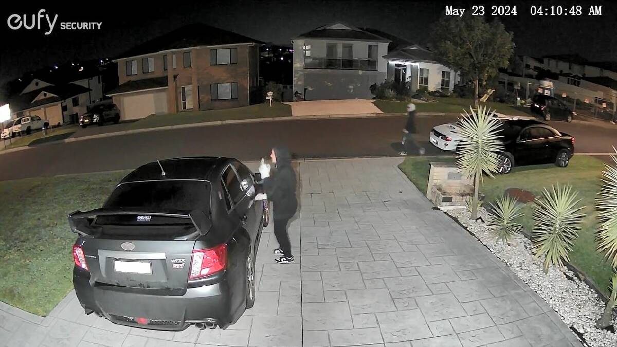Would-be thief gives a home's CCTV camera the bird after they are unable to get into the locked Subaru parked in the driveway on Thursday, May 23, 2024. Picture supplied