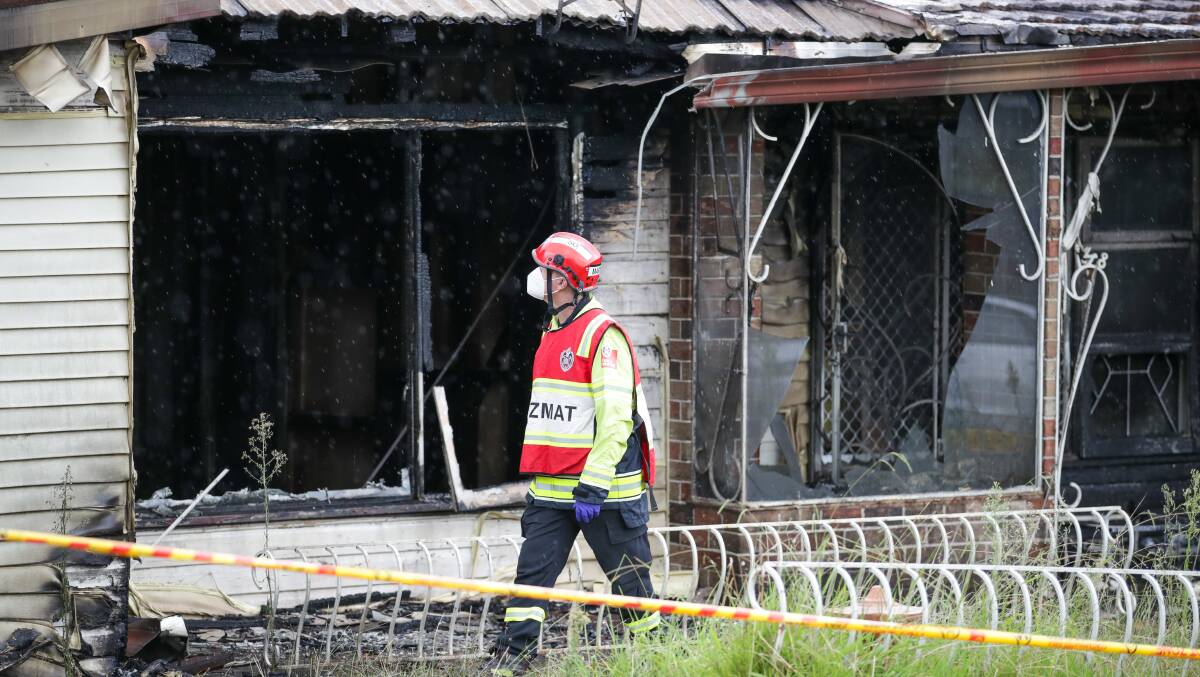 Specialist HAZMAT crews were called in after a suspicious fire destroyed a Farmborough Road home in the early hours of Wednesday morning. Picture by Adam McLean