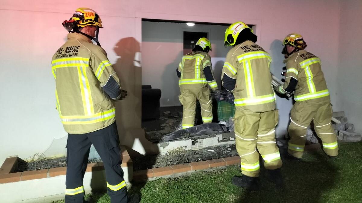 Firefighters at the scene of a damaged Corrimal unit block after a car slammed into it on Sunday, June 23, 2024. Picture supplied