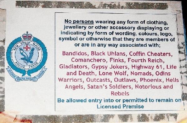 A sign banning bikie gang logos, symbols and colours from pubs and clubs.