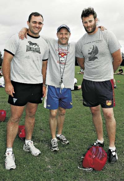 Dapto coach Dean Callaway (centre) with new props Chris Leikvoll (left) and Shaun Wessel, look forward to 2008. Picture: WAYNE VENABLES