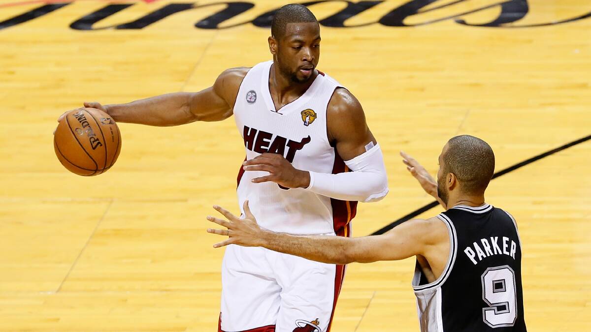 LeBron James starred with 37 points as Miami Heat won their second consecutive NBA championship after defeating San Antonio Spurs 95-88 in game seven of the NBA finals. Photo: Getty Images.