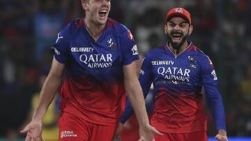 Cameron Green hails his run-out of Tristan Stubbs, as RCB captain Virat Kohli looks on in delight. (AP PHOTO)