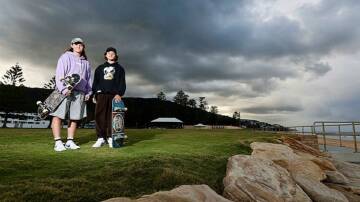 Skateboarders Felicity Turner and Toby Smith at Thirroul Beach. Picture by Adam McLean. 